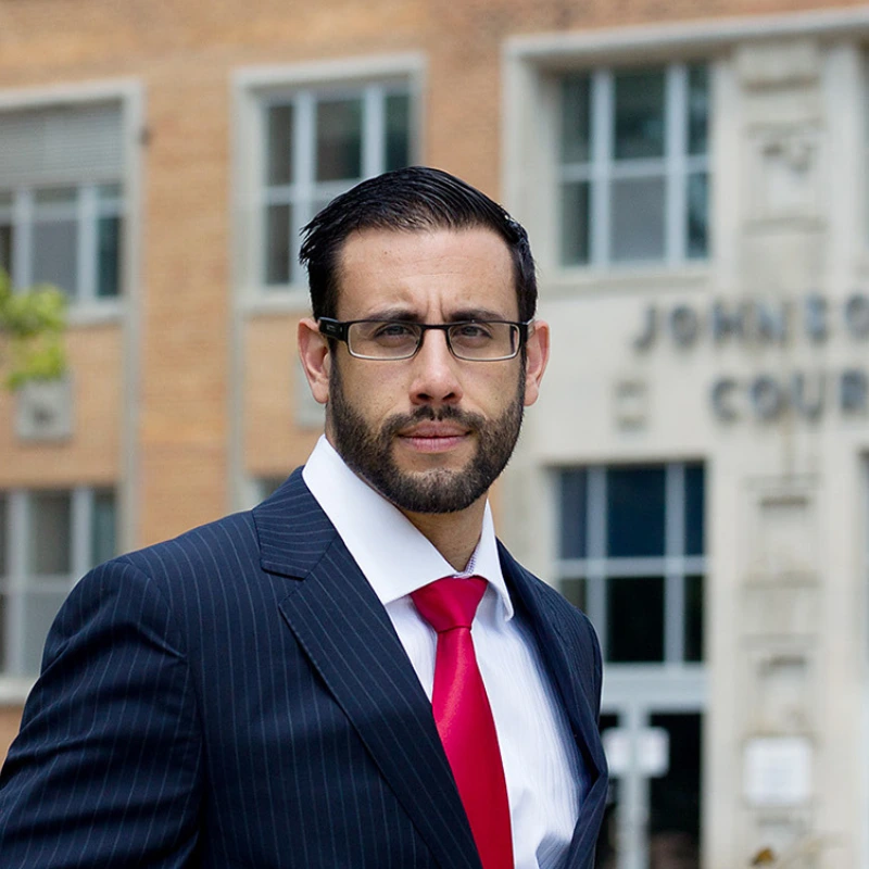 Vincent Rivera standing in front of Johnson County Court House